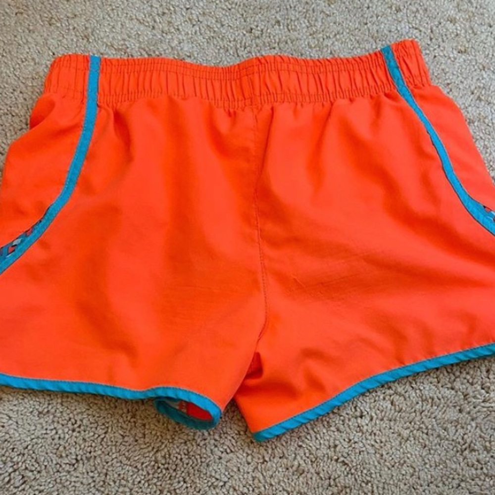 bright orange and blue athletic shorts